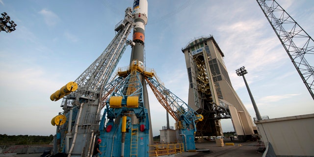 Oct. 14, 2011: Soyuz VS01, the first Soyuz flight from Europes Spaceport in French Guiana, sits on the launchpad awaiting the green light to lift off.The vehicle was rolled out horizontally on its erector from the preparation building to the launch zone and then raised into the vertical position. The Upper Composite, comprising the Fregat upper stage, payload and fairing, was also transferred and added onto the vehicle from above, completing the very first Soyuz on its launch pad at Europes Spaceport.Soyuz VS01 will lift off on 20 October 2011. The rocket will carry the first two satellites of Europes Galileo navigation system into orbit.