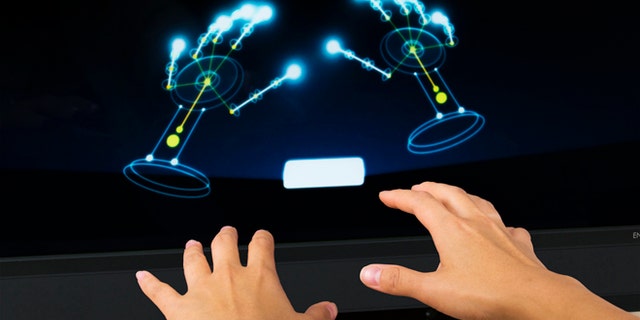 This project image released by Leap Motion shows the Leap Motion Controller that went on sale earlier this year. Motion-detecting and touch-sensitive controllers were among the topics discussed at the Game Developers Conference Next at the Los Angeles Convention Center on Nov. 5-7, 2013. (AP Photo/Leap Motion)