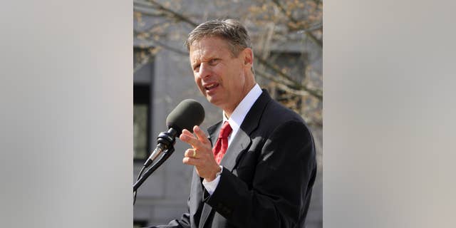 Former New Mexico Gov. Gary Johnson announces his plans to seek the Republican nomination for president in front of the Statehouse Thursday, April 21, 2011 in Concord, N.H. (AP Photo/Jim Cole)