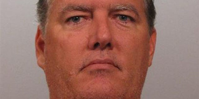 This undated photo provided by the Jacksonville Sheriff's Office shows Michael David Dunn, 45, who is charged with murder and attempted murder in the Nov. 23 shooting at a Jacksonville, Fla., gas station.