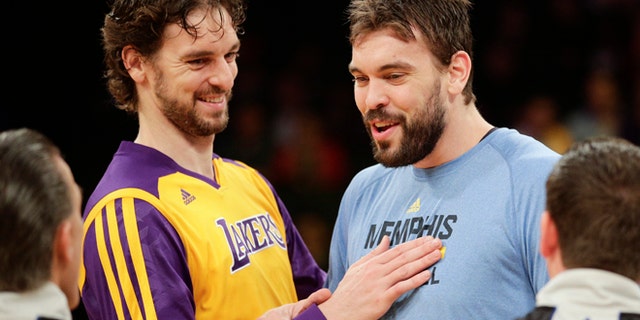 Pau Gasol, left, and his brother, Memphis Grizzlies' Marc Gasol in a Nov. 15, 2013, file photo.