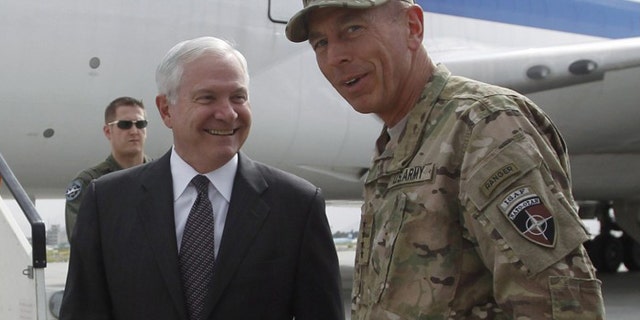 June 4: Secretary of Defense Robert Gates, left, is greeted in Kabul by General David Petraeus. Gates arrived on his final trip to Afghanistan as Pentagon chief on Saturday, acknowledging Americans have grown tired of war but warning that success was imperative because failure would be the most costly result.