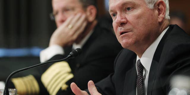 Secretary of Defense Robert Gates and Chairman of the Joint Chiefs of Staff Adm. Michael Mullen testify regarding the Department of Defense Fiscal Year 2012 budget request before the Senate Appropriations Committee Subcommittee on Defense on Capitol Hill in Washington, Wednesday, June 15, 2011. (AP Photo/Charles Dharapak)