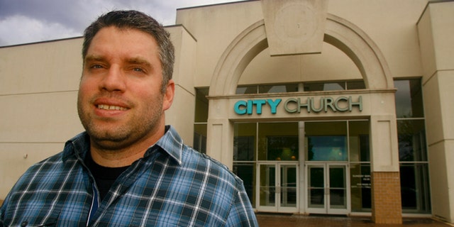 Aug 20, 2013: City Church of Tallahassee Pastor Dean Inserra stands outside his church in Tallahassee, Fla.