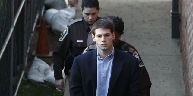Feb. 9, 2012: George Huguely V is escorted to Charlottesville Circuit Court by members of the Charlottesville Sheriff's Office for the start of his trial in Charlottesville, Va.
