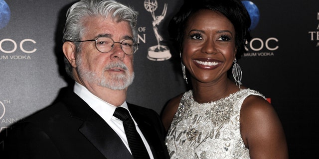 June 16, 2013: In this file photo, George Lucas, left, and longtime girlfriend Mellody Hobson arrive at the 40th Annual Daytime Emmy Awards in Beverly Hills, Calif.