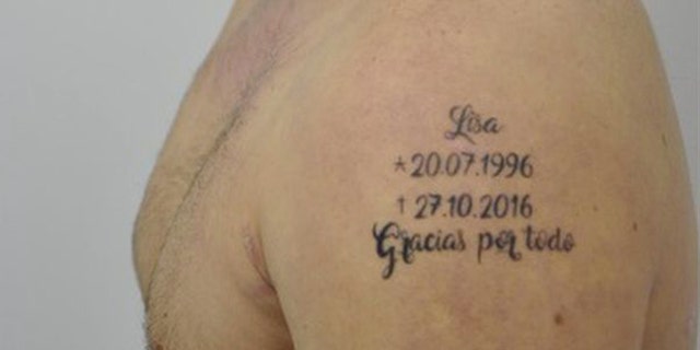 A close-up of the tell-tale tattoo. (Photo: Spain's Policia Nacional)