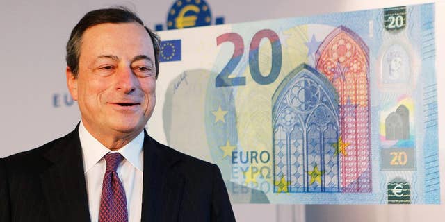 FILE - In this Tuesday, Feb. 24, 2015, file photo, Mario Draghi, president of the European Central Bank, stands next to a facsimile of the new 20 euro banknote in Frankfurt, Germany. Analysts are already talking about when and how the European Central Bank might extend its 1.1 trillion euro ($1.2 trillion) stimulus program that has been running for the past six months in an attempt to boost the modest recovery in the 19 countries that use the euro. (AP Photo/Michael Probst, File)