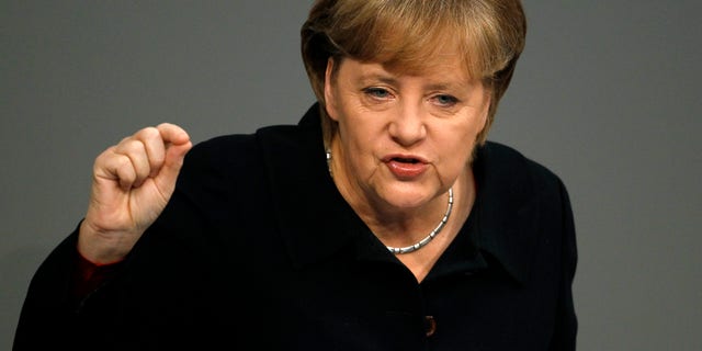Dec. 2, 2011: German Chancellor Angela Merkel gestures during her speech at the German Federal Parliament, Bundestag, in Berlin, Germany.