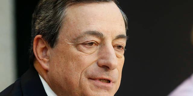 President of the European Central Bank, ECB, Mario Draghi speaks during a news conference in Frankfurt, Germany, Thursday, April 3, 2014, following a meeting of the ECB governing council. The ECB decided to leave its main interest rate unchanged. (AP Photo/Michael Probst)