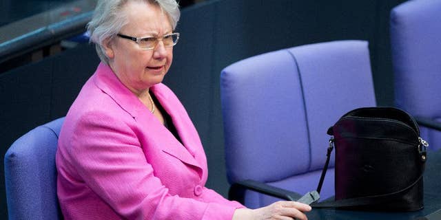 Former German Education Minister Anette Schavan, attends a session in the German parliament in Berlin, Thursday March 20, 2014. The former German minister who quit over plagiarism allegations has failed in a bid to have a court reverse the withdrawal of her doctorate.Annette Schavan, considered a close ally of Chancellor Angela Merkel, was Germany’s education minister for more than seven years until she resigned in Feb. 2013. She stepped down after an academic panel at Duesseldorf's Heinrich Heine University voted to revoke her doctorate. An administrative court in Duesseldorf on Thursday upheld that decision. (AP Photo/dpa, Maurizio Gambarini)