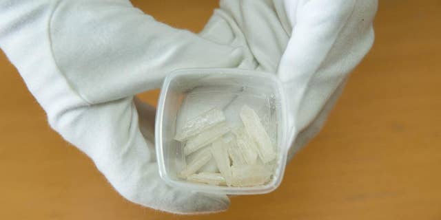 Crystal meth crystals are presented at the State Office for Criminal Investigations in Berlin, Wednesday, July 22, 2015. More than three kilograms of the drug were seized in an operation by Berlin police. (Joerg Carstensen/dpa via AP)