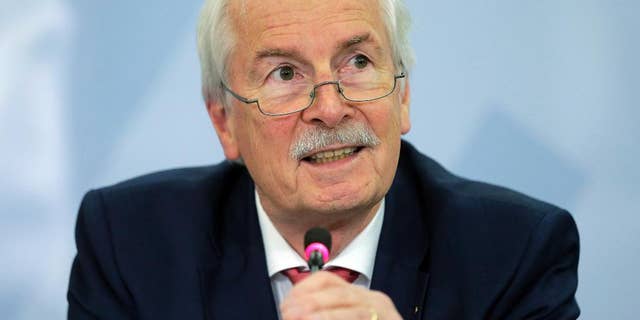 Germany's chief federal prosecutor Harald Range speaks during a news conference in Karlsruhe, Germany, Thursday, Nov. 11, 2014. Range said his office so far has found no actionable evidence that Chancellor Angela Merkel’s calls were tapped by the U.S. National Security Agency, but the investigation continues. (AP Photo/dpa, Ronald Wittek)
