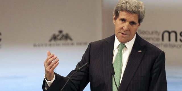 February 1, 2014: US Secretary of State John Kerry addresses the participants during the 50th Security Conference in Munich, Germany. (AP Photo/Frank Augstein)