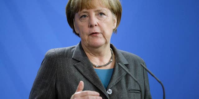 German Chancellor Angela Merkel speaks during a joint press conference as part of a meeting with Prime Minister of Slovenia Miro Cerar, at the chancellery in Berlin, Germany, Thursday, Oct. 30, 2014. (AP Photo/Michael Sohn)