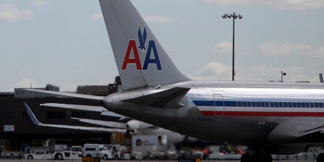 NEW YORK, NY - APRIL 27: An American Airlines plane is seen at John F. Kennedy International Airport April 27, 2012 in the Queens borough of New York City. (Photo by Allison Joyce/Getty Images)