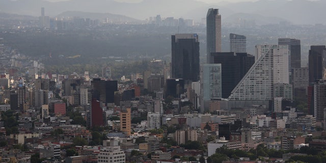 Mexico City skyline is seen through the haze from the Latino Tower in Mexico City, Mexico. (Photo by John Moore/Getty Images)