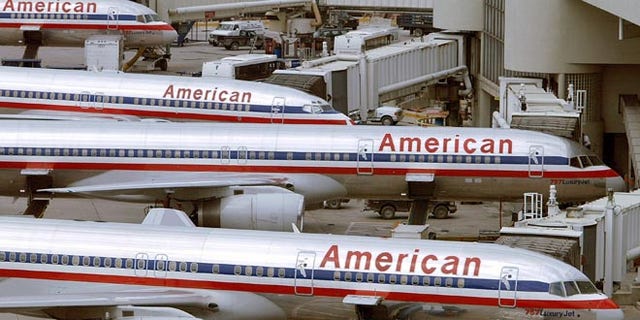 MIAMI - OCTOBER 16:  (FILE PHOTO)  American Airlines planes sit at a Miami International Airport terminal October 16, 2002 in Miami, Florida. Airline officials announced April 2, 2003 that a lay off of approximately 2,500 pilots will occur over the next year to try and prevent bankruptcy.  (Photo by Joe Raedle/Getty Images)