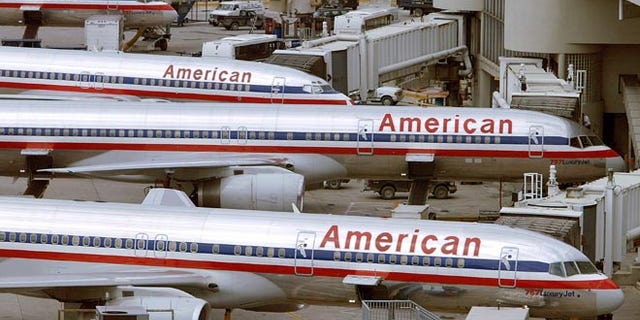 MIAMI - OCTOBER 16: (FILE PHOTO) American Airlines planes sit at a Miami International Airport terminal October 16, 2002 in Miami, Florida. Airline officials announced April 2, 2003 that a lay off of approximately 2,500 pilots will occur over the next year to try and prevent bankruptcy. (Photo by Joe Raedle/Getty Images)