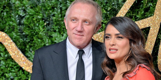 LONDON, ENGLAND - NOVEMBER 23: Francois Henri Pinault and Salma Hayek attend the British Fashion Awards 2015 at London Coliseum on November 23, 2015 in London, England. (Photo by Anthony Harvey/Getty Images)
