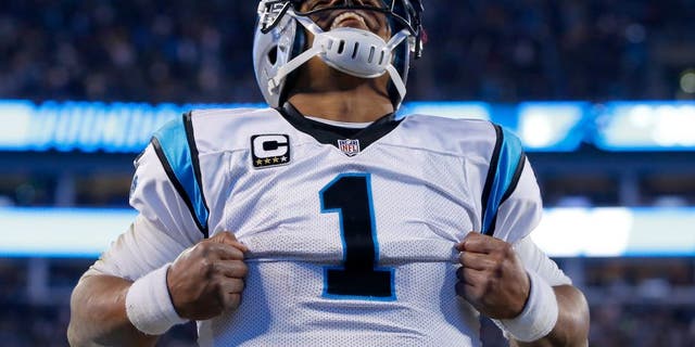 CHARLOTTE, NC - JANUARY 24: Cam Newton #1 of the Carolina Panthers celebrates after scoring a touchdown in the third quarter against the Arizona Cardinals during the NFC Championship Game at Bank of America Stadium on January 24, 2016 in Charlotte, North Carolina. (Photo by Kevin C. Cox/Getty Images)