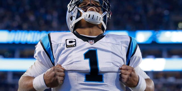 CHARLOTTE, NC - JANUARY 24: Cam Newton #1 of the Carolina Panthers celebrates after scoring a touchdown in the third quarter against the Arizona Cardinals during the NFC Championship Game at Bank of America Stadium on January 24, 2016 in Charlotte, North Carolina. (Photo by Kevin C. Cox/Getty Images)