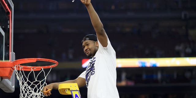 HOUSTON, TEXAS - APRIL 04: Kris Jenkins #2 of the Villanova Wildcats cuts the net after defeating the North Carolina Tar Heels 77-74 to win the 2016 NCAA Men's Final Four National Championship game at NRG Stadium on April 4, 2016 in Houston, Texas. (Photo by Ronald Martinez/Getty Images)
