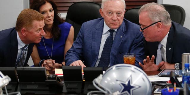 Dallas Cowboys executives in the "War Room" with head coach Jason Garrett, left, and team principals Charlotte Jones Anderson, owner Jerry Jones and Stephen Jones, right, as the Cowboys take part in the NFL Draft on Thursday, April 28, 2016, at the team Headquarters at Valley Ranch in Irving, Texas. (Paul Moseley/Fort Worth Star-Telegram/TNS via Getty Images)