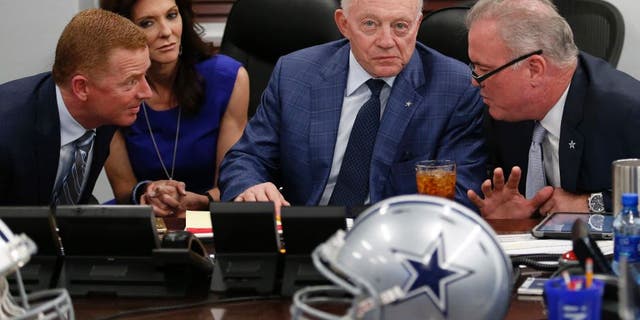 Dallas Cowboys executives in the "War Room" with head coach Jason Garrett, left, and team principals Charlotte Jones Anderson, owner Jerry Jones and Stephen Jones, right, as the Cowboys take part in the NFL Draft on Thursday, April 28, 2016, at the team Headquarters at Valley Ranch in Irving, Texas. (Paul Moseley/Fort Worth Star-Telegram/TNS via Getty Images)