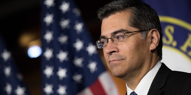 WASHINGTON, DC - MAY 11: Rep. Xavier Becerra (D-CA) listens during a news conference to discuss the rhetoric of presidential candidate Donald Trump, at the U.S. Capitol, May 11, 2016, in Washington, DC. Donald Trump is scheduled to meet with Speaker of the House Paul Ryan on Thursday near Capitol Hill. (Photo by Drew Angerer/Getty Images)