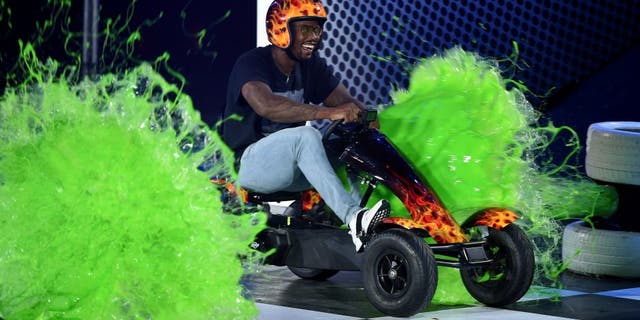 WESTWOOD, CA - JULY 14: NFL player Von Miller is slimed onstage during the Nickelodeon Kids' Choice Sports Awards 2016 at UCLA's Pauley Pavilion on July 14, 2016 in Westwood, California. (Photo by Kevin Winter/Getty Images)
