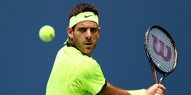 NEW YORK, NY - SEPTEMBER 05:  Juan Martin del Potro of Argentina returns a shot to against Dominic Thiem of Austria during his fourth round Men's Singles match on Day Eight of the 2016 US Open at the USTA Billie Jean King National Tennis Center on September 5, 2016 in the Flushing neighborhood of the Queens borough of New York City.  (Photo by Al Bello/Getty Images)