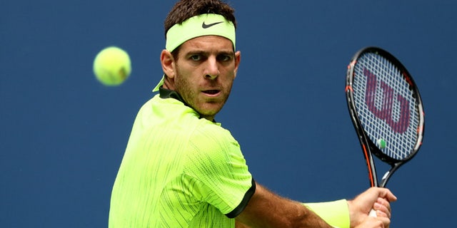 NEW YORK, NY - SEPTEMBER 05: Juan Martin del Potro of Argentina returns a shot to against Dominic Thiem of Austria during his fourth round Men's Singles match on Day Eight of the 2016 US Open at the USTA Billie Jean King National Tennis Center on September 5, 2016 in the Flushing neighborhood of the Queens borough of New York City. (Photo by Al Bello/Getty Images)