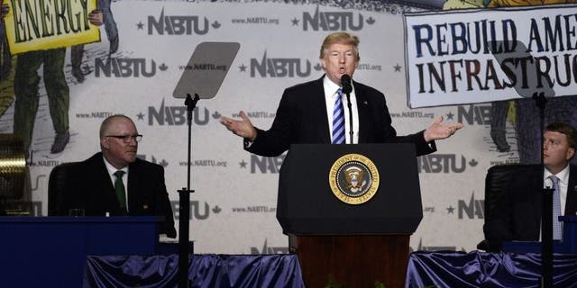 WASHINGTON, D - APRIL 4: US President Donald Trump makes remarks at the 2017 North America's Building Trades Unions National Legislative Conference at the Washington Hilton on April 4, 2017 in Washington, DC. (Photo by Olivier Douliery-Pool/Getty Images)