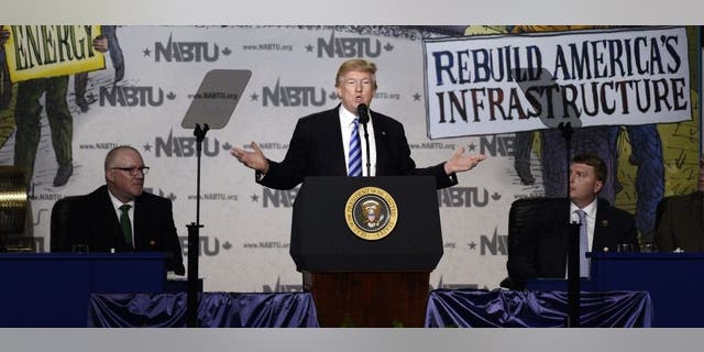 WASHINGTON, D - APRIL 4: US President Donald Trump makes remarks at the 2017 North America's Building Trades Unions National Legislative Conference at the Washington Hilton on April 4, 2017 in Washington, DC. (Photo by Olivier Douliery-Pool/Getty Images)