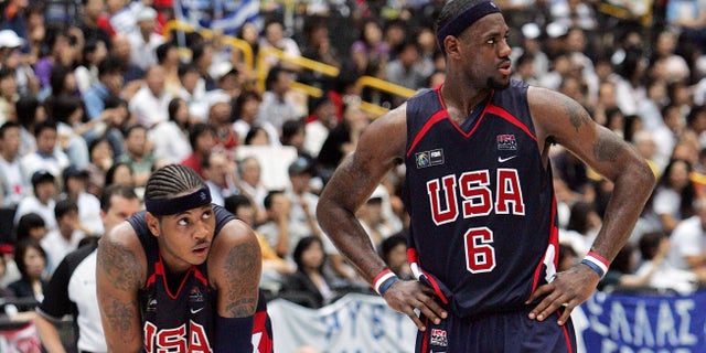 SAITAMA, JAPAN - SEPTEMBER 1: Carmelo Anthony #15 and LeBron James #6 of US wait for the free throw of Greece before the game ended during the FIBA World Championship 2006 Semi-Finals on September 1, 2006 in Saitama, Japan. The Championship takes place from August 19 to September 3 in Japan. (Photo by Junko Kimura/Getty Images)