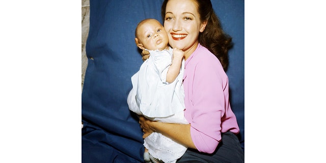 Dorothy Lamour with one of her sons, circa 1945.