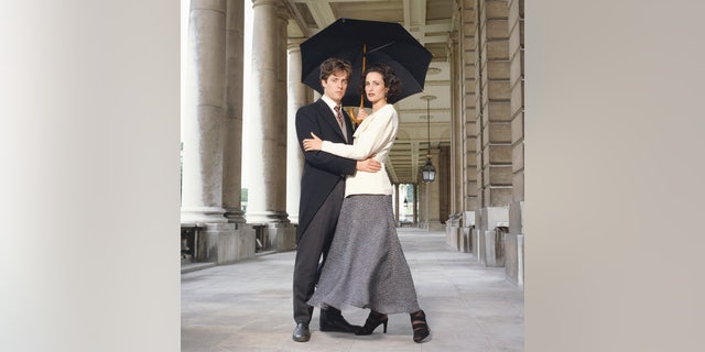 Actor Hugh Grant and actress Andie MacDowell posing as their characters from Richard Curtis' 1994 comedy "Four Weddings and a Funeral."