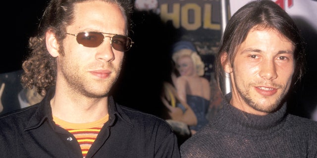 Toby Smith and Jason Kay of the funk/rock band Jamiroquai attend the press conference to announce release of the "Godzilla" soundtrack on May 18, 1998 at Planet Hollywood in New York City.