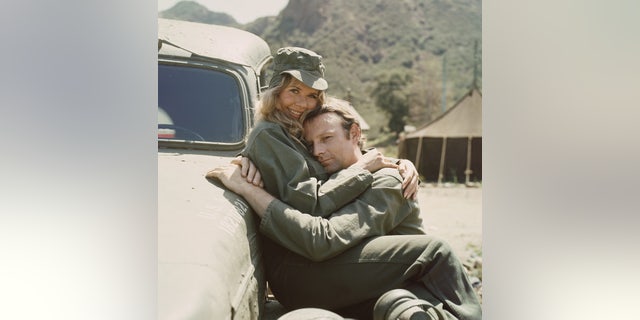 Loretta Swit, as Major Margaret Houlihan, and Larry Linville (1939 - 2000), as Major Frank Burns, on the television series 'M*A*S*H' in 1972.