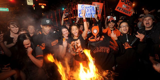 Oct. 28, 2012: San Francisco Giants fans celebrate outside PacBell Park in San Francisco after the Giants swept baseball's World Series against the Detroit Tigers.