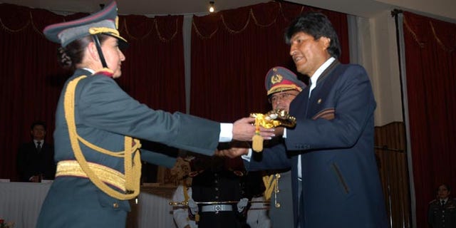 Bolivian Gen. Gina Reque Terán (L) with Bolivian President Evo Morales (R).