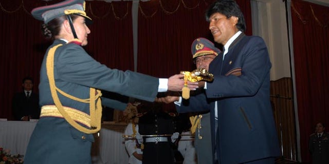 Bolivian Gen. Gina Reque Terán (L) with Bolivian President Evo Morales (R).