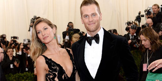 NEW YORK, NY - MAY 05: Model Gisele Bundchen (L) and NFL player Tom Brady attend the "Charles James: Beyond Fashion" Costume Institute Gala at the Metropolitan Museum of Art on May 5, 2014 in New York City. (Photo by Dimitrios Kambouris/Getty Images)