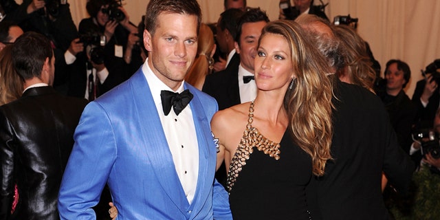 NEW YORK, NY - MAY 06: NFL player Tom Brady (L) and model Gisele Bundchen attend the Costume Institute Gala for the "PUNK: Chaos to Couture" exhibition at the Metropolitan Museum of Art on May 6, 2013 in New York City. (Photo by Jamie McCarthy/Getty Images for The Huffington Post)