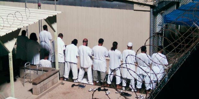 FILE: 2009: Detainees prayer at a detention facility at Guantanamo Bay U.S. Naval Base, in Cuba.
