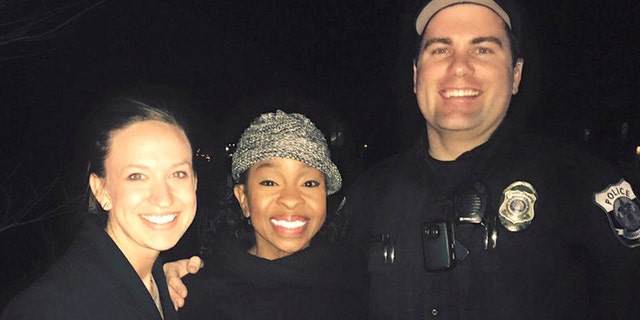 This photo provided by officer Paul Rogerson shows Rogerson, right, of the Pleasant Grove Police Department in Utah, singer Gladys Knight, center, and Rogerson's wife, left. (Courtesy of Paul Rogerson via AP)