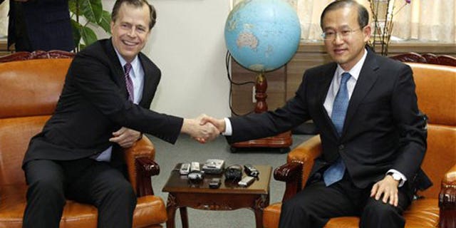 Feb. 25, 2012: U.S. special representative on North Korea policy Glyn Davies, left, shakes hands with South Korea's nuclear envoy Lim Sung-nam during their meeting at the Foreign Ministry in Seoul, South Korea.
