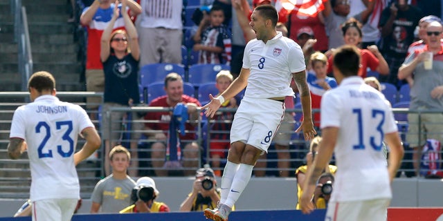 United States' Clint Dempsey (8) celebrates his goal against Cuba during the first half of a CONCACAF Gold Cup soccer quarterfinal match, Saturday, July 18, 2015, in Baltimore. (AP Photo/Patrick Semansky)