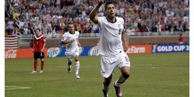 United States forward Clint Dempsey (8) celebrates his goal against Canada in the second half of a CONCACAF Gold Cup soccer match at Ford Field in Detroit, Tuesday, June 7, 2011. (AP Photo/Paul Sancya)